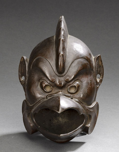 <b>A BRONZE VESSEL IN SHAPE OF A TENGU MASK</b>