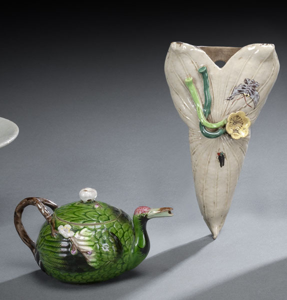 <b>A POLYCHROME DECORATED POTTERY CRANE-SHAPED TEAPOT AND COVER AND A WALL VASE</b>