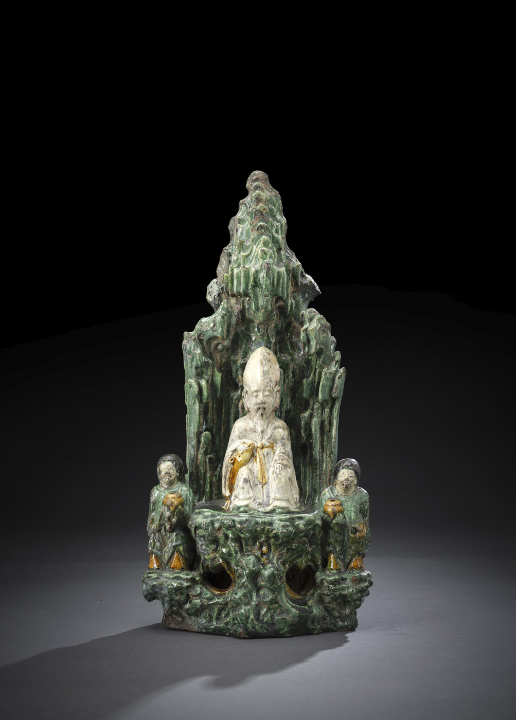 <b>A FAHUA GROTTO WITH SHOULAO AND TWO ADORANTS</b>
