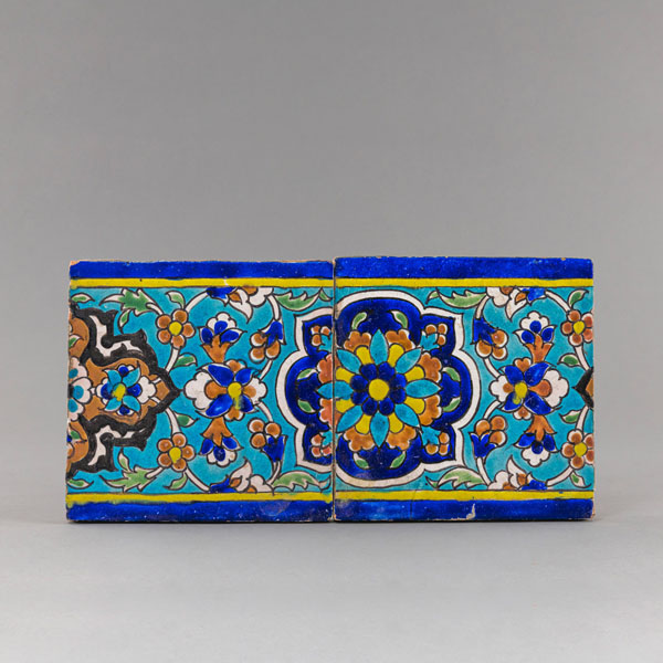 <b>TWO POLYCHROME PAINTED POTTERY TILES</b>