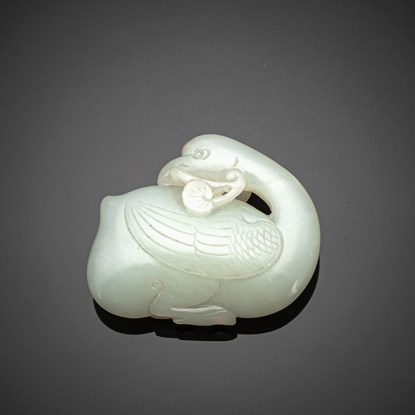 <b>A FINE CARVED LIGHT GREEN JADE DUCK</b>