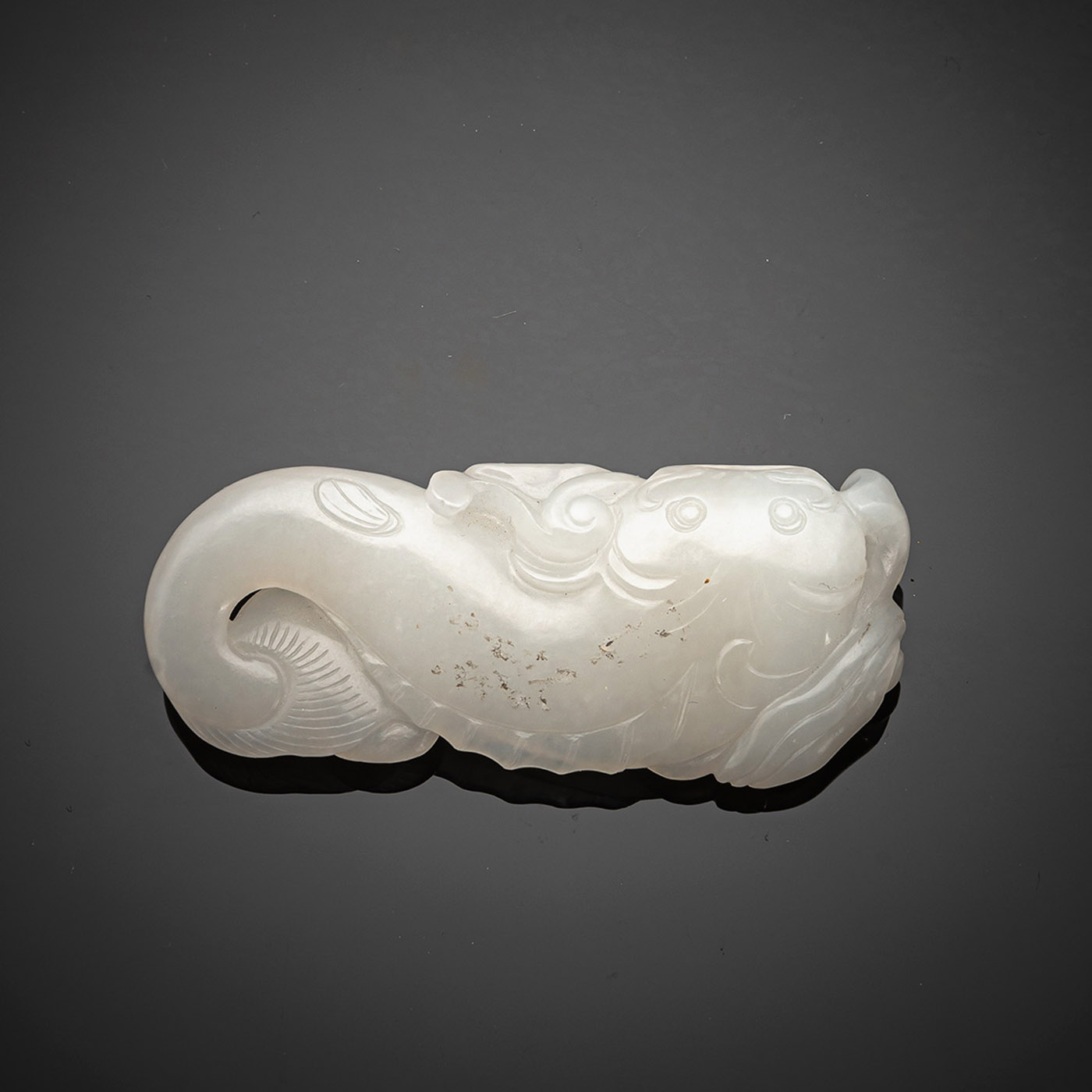<b>A FINE CARVED WHITE JADE PENDANT IN SHAPE OF A CATFISH AND ITS YOUTH WITH LINGZHI</b>