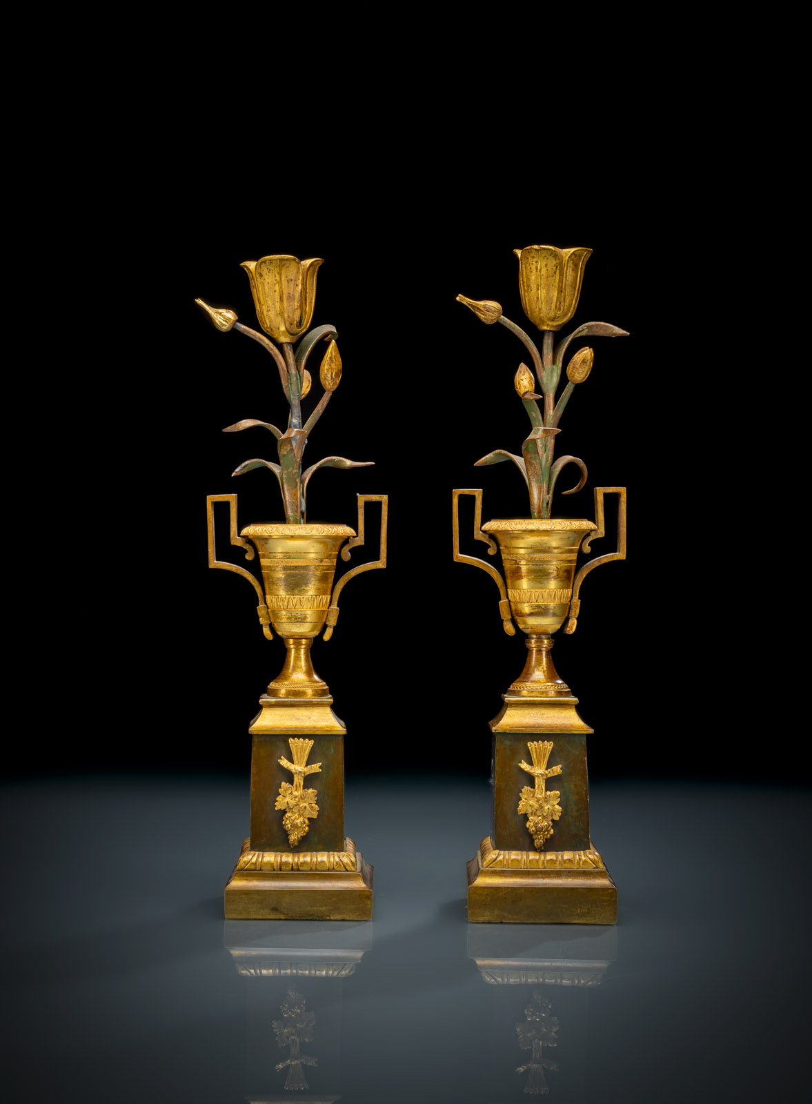 <b>A PAIR OF ORMOLU AND PAINTED BRONZE EMPIRE CANDLESTICKS</b>