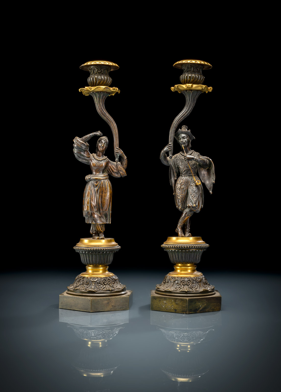 <b>A PAIR OF CHARLES X ORMOLU AND PATINATED BRONZE CANDLESTICKS OF CHINOISE STYLE</b>
