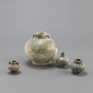 <b>THREE MINIATURE VASES AND A GLOBULAR LUGGED VASE</b>
