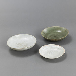 <b>A 'SHUFU' DRAGON BOWL, A 'LONGQUAN' LOTUS BOWL, AND A 'QINGBAI' FLORAL DISH</b>
