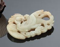 <b>A JADE CARVING IN SHAPE OF A PHOENIX WITH EUROPEAN MOUNT AS BROOCH</b>