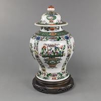 <b>A FAMILLE VERTE FLORAL BALUSTER VASE AND COVER</b>