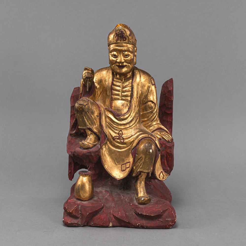 <b>A PART-GILT WOOD FIGURE OF JI GONG</b>