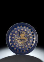<b>A FINE AND  LARGE GILT-DECORATED POWDER-BLUE GLAZED DISH WITH DRAGON 'EN FACE'</b>