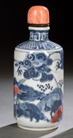 <b>A BLUE AND WHITE AND COPPER-RED ZODIAC TABLE SNUFF BOTTLE WITH CORAL STOPPER</b>