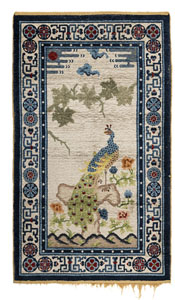 <b>A PAOTOU RUG WITH PEACOCK DECORATION</b>