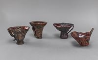 <b>FOUR RICHLY DECORATED LIBATION CUPS</b>