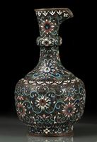 <b>A SILVERED-COPPER CHAMPLEVÉ EWER</b>