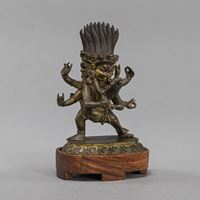 <b>A SMALL BRONZE FIGURE OF MAHAKALA IN YAB-YUM WITH HIS CONSORT</b>