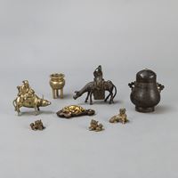 <b>TWO BRONZE RIDERS, A BRONZE VESSEL, A CENSER, AND FOUR BRONZE FO-LION PAPERWEIGHTS</b>