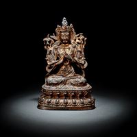 <b>A BRONZE FIGURE OF MANJUSRI</b>