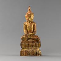 <b>SEATED WOODEN FIGURE OF BUDDHA MARAVIJAYA WITH RED LACQUER AND GILDING</b>