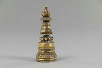 <b>A SMALL GILT-BRONZE STUPA</b>