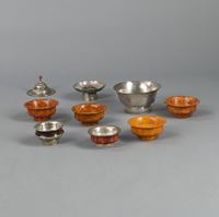 <b>A SILVER BOWL, A CUP STAND, AND PARTIALLY SILVER-MOUNTED TEA BOWLS</b>