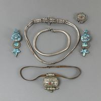 <b>LOT OF SIX PIECES OF SILVER JEWELRY: A PAIR OF EARRINGS WITH TURQUOISE EMBELLISHMENT, TWO AMULETS AND TWO NECKLACES</b>
