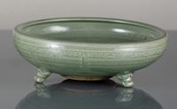 <b>A TRIPOD CELADON BAGUA CENSER</b>