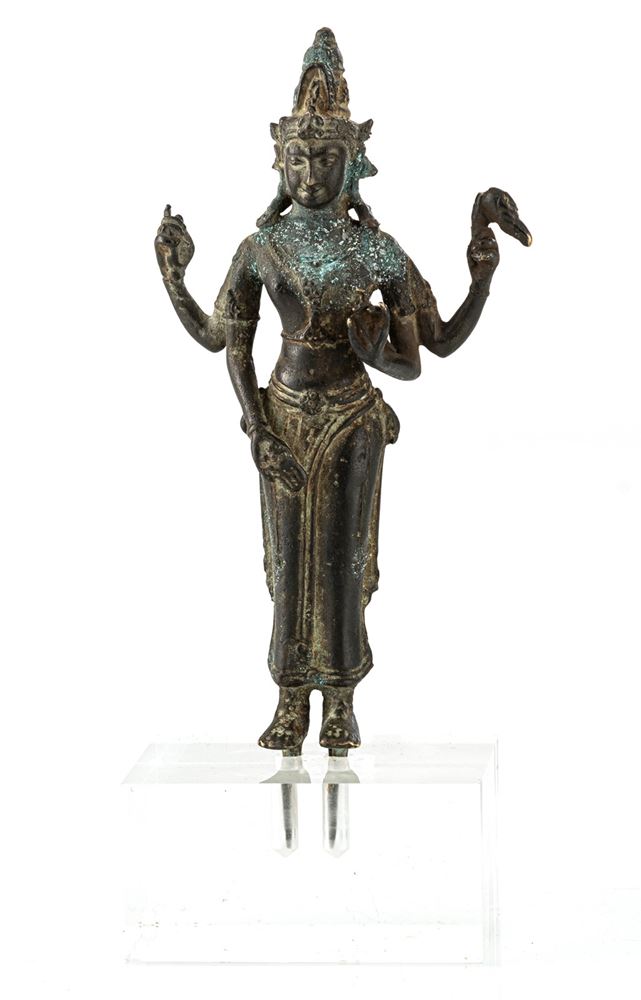 <b>A BRONZE FIGURE OF A STANDING FOUR-ARMED DEITY</b>