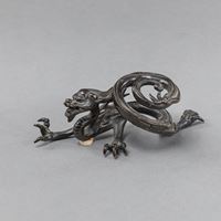 <b>A BRONZE DRAGON BRUSHREST</b>