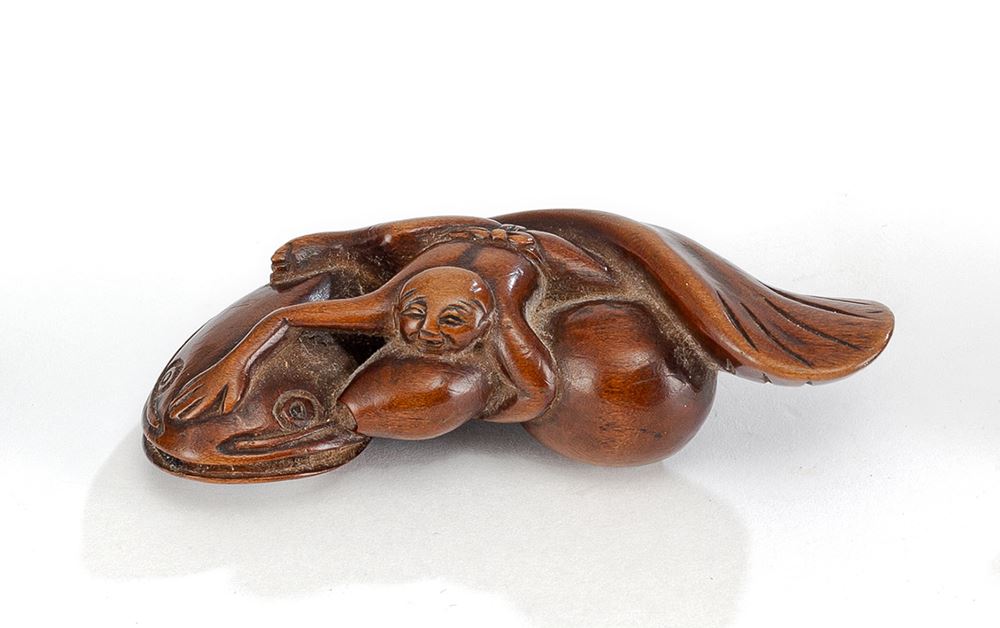 <b>A BOXWOOD NETSUKE OF KADORI MYÔJIN</b>