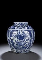 <b>A LARGE BLUE AND WHITE FLOWER AND BIRD JAR</b>