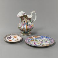 <b>A CANTON ENAMEL FAMILLE ROSE EWER, AN OVAL CANTON PLATE AND A SMALL FISH DISH</b>