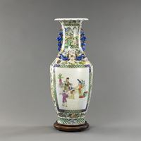 <b>POLYCHROME PORCELAIN FLOOR VASE IN BALUSTER FORM WITH LION HANDLES AND FIGURAL DECORATION</b>