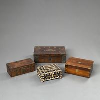 <b>FOUR PARTIALLY METAL-FITTED WOOD BOXES WITH INLAYS</b>