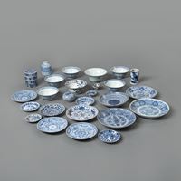 <b>LOT OF BLUE AND WHITE PORCELAINS, PARTLY PAINTED WITH GOLD: A FOUR-PART STACKING BOX, A VASE, A BRUSH POT, A LIDDED BOX, EIGHT BOWLS AND 14 PLATES/SAUCERS</b>
