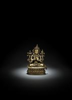 <b>A FINE SILVER-INLAID AND INSCRIBED BRONZE FIGURE OF MAITREYA</b>