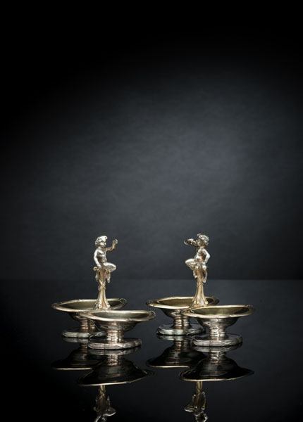 <b>A PAIR OF FRENCH PARCEL GILT SILVER SPICE STANDS WITH PUTTI</b>