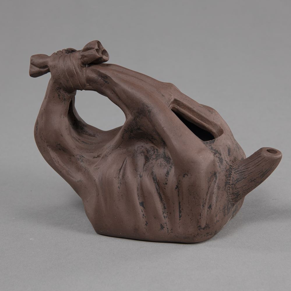 <b>A ZISHA-WARE BAG-SHAPED TEAPOT</b>