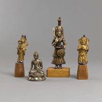 <b>FOUR PARCEL-GILT BRONZE FIGURES, E.G. OF BUDDHA</b>