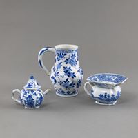 <b>A SMALL UNDERGLAZE BLUE DECORATED TEAPOT, A SPITTOON AND A WATER JUG</b>