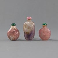 <b>THREE QUARTZ SNUFFBOTTLES PARTIALLY WITH CARVED FLORAL DESIGN AND A FIGURAL SCENE</b>