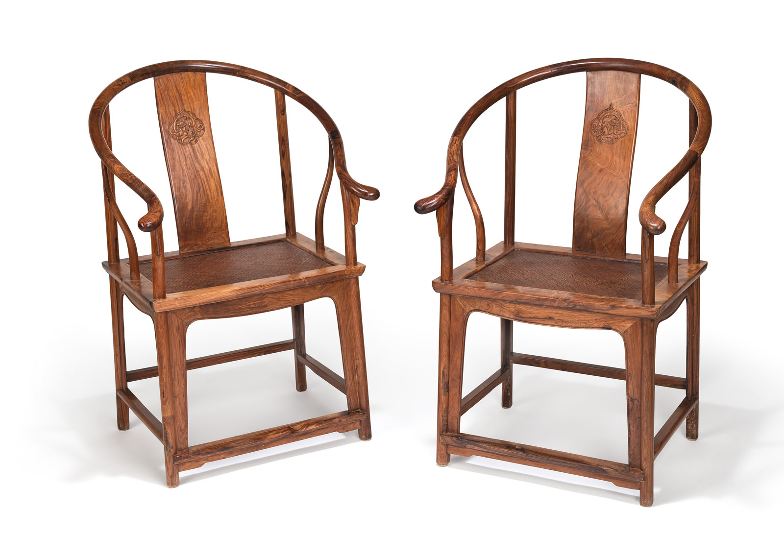 <b>A PAIR OF HUANGHUALI WOOD 'CHILONG' DRAGON MEDALLION HORSESHOE-BACK ARMCHAIRS 'QUANYI'</b>