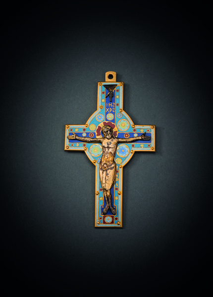 Gilt brass cross, decorated with blue, yellow, white, and red cloisonné enamel. Applied silvergilt body of Christ and Hand of God. The crossed signed on reverse 