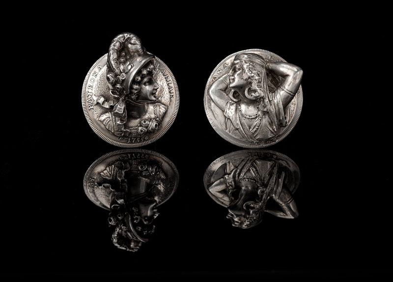 The silver coins of 1755 and 1756. High relief chased centre with womens' busts. Tog. circa 55,5 grams. One with traces of solder and remnants of black enamel.