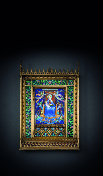 Of Gothic style. Silvergilt openwork frame, central silver plaque with Virgin and Child surrounded by angels and framed by lilies and flower tendrils of very fine translucient enamel. 1300 grams circa. Minute traces of age.