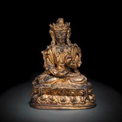 <b>A GILT-LACQUERED BRONZE FIGURE OF A BODHISATTVA SEATED ON A LOTUS THRONE</b>