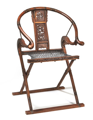 <b>A FOLDING HORSESHOE-BACK ARMCHAIR WITH CARVED QILIN BACKREST</b>
