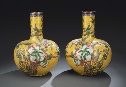 <b>A PAIR OF YELLOW GROUND 'NINE PEACHES' PART-GILT CLOISONNÉ ENAMEL VASES IN RELIEF</b>