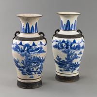<b>A PAIR OF BLUE AND WHITE PORCELAIN LANDSCAPE VASES</b>