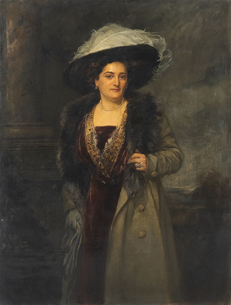 Portrait der Maria Reuter aus Mannheim in großer Garderobe mit Federhut. Öl/Lwd., unten links signiert und datiert 1911.