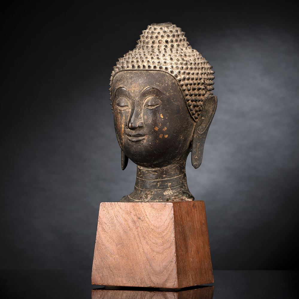 <b>A BRONZE HEAD OF BUDDHA SHAKYAMUNI</b>